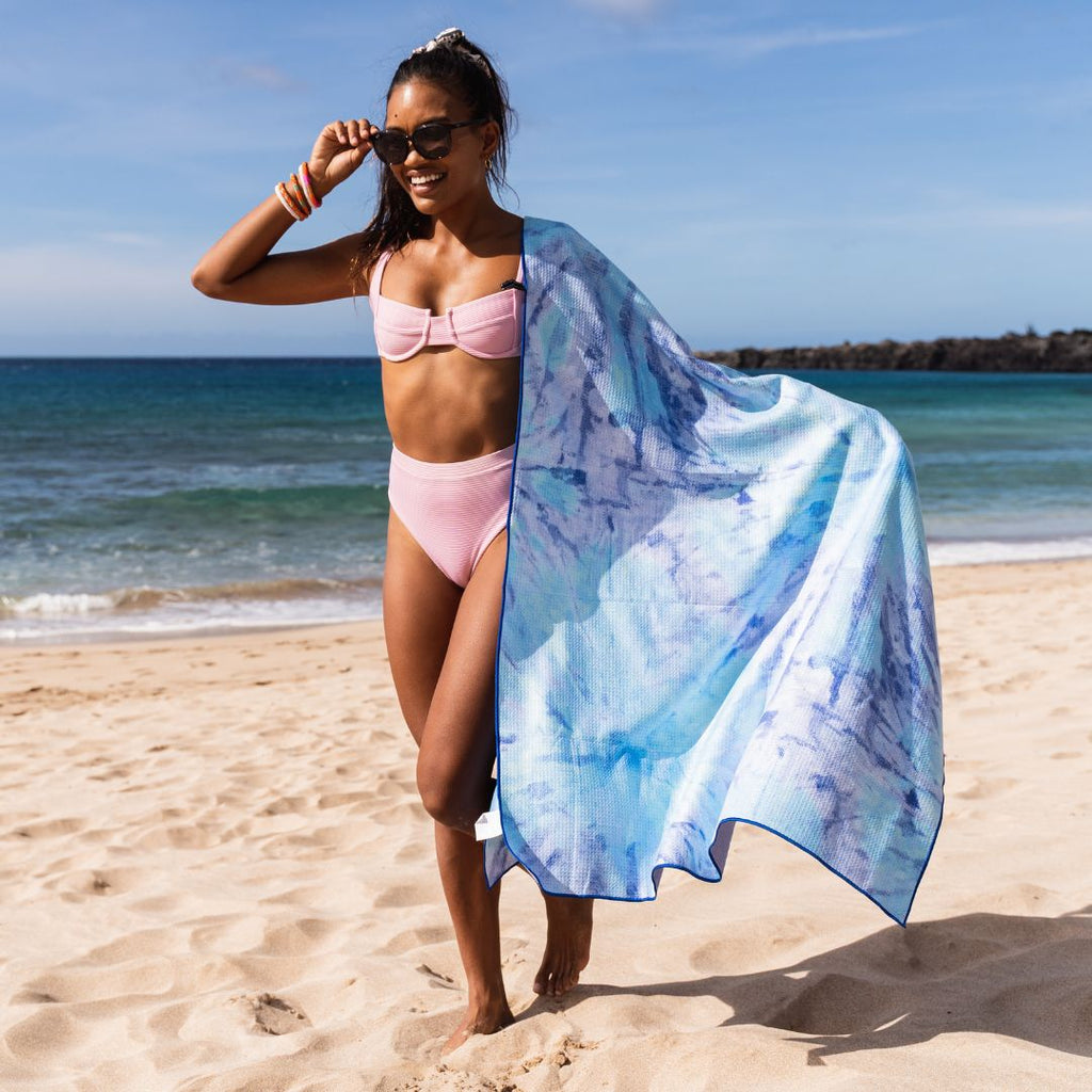 https://www.canacapri.com/cdn/shop/products/tie-dye-splash-beach-towel-465126_1024x1024.jpg?v=1671736873